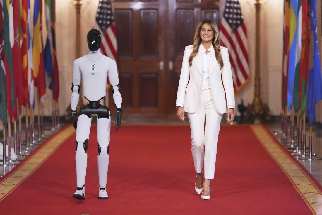 Melania Trump shares the spotlight with a robot at an education and technology event : NPR
